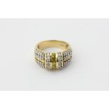 A yellow and white diamond four row dress ring, in 18ct gold