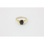 A sapphire single stone ring, oval cut claw set in 18ct yellow gold