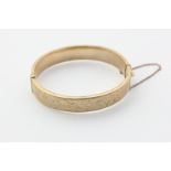 A 9ct gold bangle, 13.5g