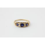 A sapphire and diamond ring, in 18ct yellow gold