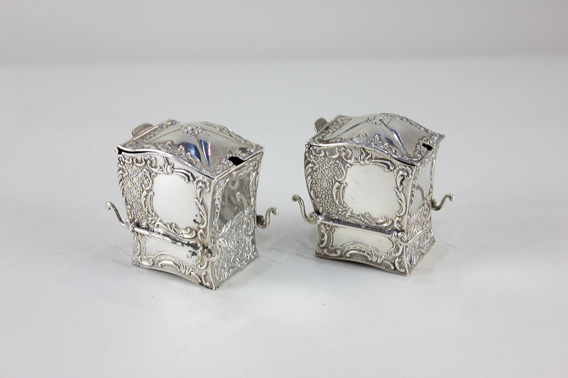 A pair of Edward VII silver cruets modelled as sedan chairs, maker Samuel Jacob, London, 1907,