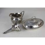 A silver plated wine funnel, with gadrooned border, a small oval tureen and cover, with reeded