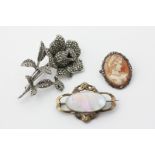 Three various brooches