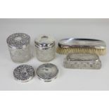A Victorian silver lidded cut glass hair tidy, makers Mappin Brothers, Birmingham, 1901, a silver