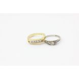 A diamond five stone ring channel set with Princess cuts in 18ct yellow gold stamped Birks; and a