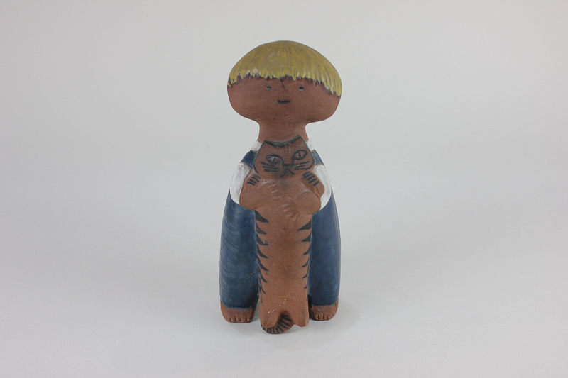 A 20th century Lisa Larson Gustavsberg Swedish pottery figure, 'Pelle', of a boy holding a cat,