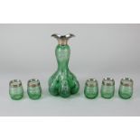 A Victorian silver mounted green glass decanter, unusual lobed form with etched floral decoration (