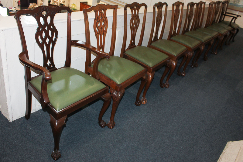 A matched set of ten Chippendale style dining chairs, comprising a set of six, including two