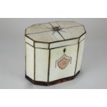A George III ivory tea caddy, faceted oval form with tortoiseshell edging and base (becoming
