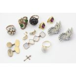 A ruby and gem set dress ring, a pair of two-stone ear studs in 9ct gold, a pair of paste clips, a