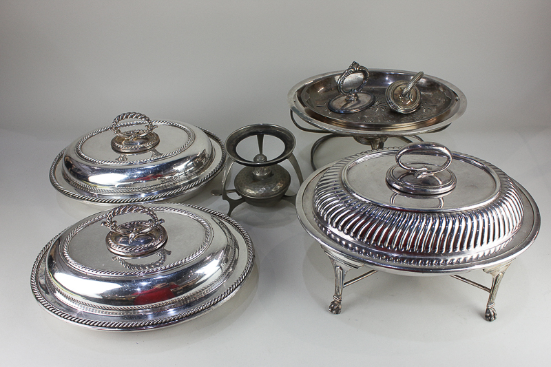 A Mappin & Webb silver plated oval entree dish with warming stand, a pair of silver plated oval