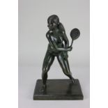 A Kenneth Child bronze sculpture of a naked figure playing tennis, signed and dated 1987, 30.5cm