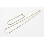 A 9ct gold triangular link necklace and matching bracelet 15.1g
