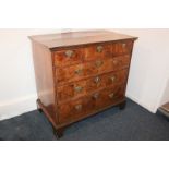 An 18th century walnut chest of three short over three long herringbone banded drawers, on bracket