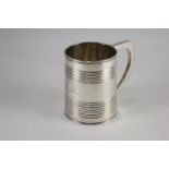 A George III silver mug, tapered form with reeded banding, presentation engraving, maker Peter and