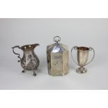 An Edward VII silver tea caddy with domed lid, Birmingham 1909, 12cm, (a/f), an embossed silver