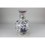 An oriental porcelain vase, of baluster form, with floral decoration and gilt embellishments, on