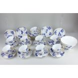 A Victorian Royal Worcester porcelain part teaset comprising eighteen tea cups, seventeen saucers