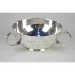 A George V silver porringer, circular shape with three handles, engraved presentation, makers