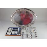 A large silver plated oval tray with pierced border, set of six silver plated and mother of pearl