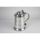 A George III silver tankard, with domed lid and scroll thumb plate, scroll handle with heart