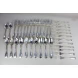 A Victorian thirty-six piece silver part canteen of cutlery, fiddle and thread pattern, with