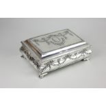 An Edward VII silver dressing table box, rectangular shape, cast with bows, swags and harebells,