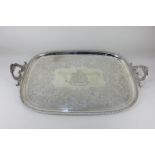 A George III silver two-handled serving tray with gadrooned border, floral decoration and engraved