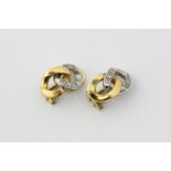 A pair of 18ct gold and diamond ear clips