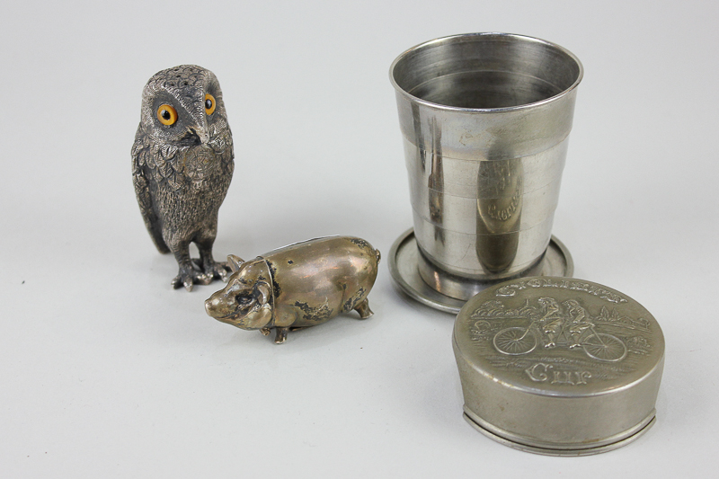 A novelty silver plated owl pepper pot, screw top head with orange glass eyes, a novelty pig vesta
