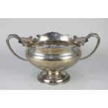 An Edward VIII silver two-handled rose bowl, with reeded silver border and foliate capped handles, a