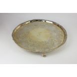 A George III silver gilt salver, circular shape with pie crust border and gadrooned edge, engraved