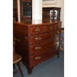 A 19th century inlaid mahogany bowfront chest of three short over three long drawers, on bracket