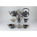 A Walker and Hall silver plated teapot, a chocolate pot, circular two-handled sugar bowl and