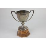 A George V silver two-handled trophy, faceted form, engraved Emsworth and District Fanciers'