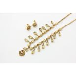 A citrine and pearl fringe necklace in 9ct gold and a pair of earrings