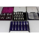 A cased set of six Victorian silver old English pattern teaspoons and tongs makers James Lewis &