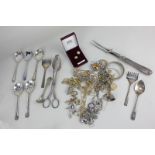 A collection of silver and costume jewellery and silver plated flatware