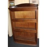 A Globe Wernicke style 'The Lebus' mahogany bookcase, with three glass fronted sections, on plinth