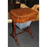 A Victorian walnut work / games table, with hinged swivel top enclosing chess board, above drawer