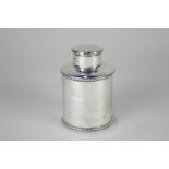 A Victorian silver tea caddy, cylindrical shape with gadrooned borders, maker Atkin Brothers,