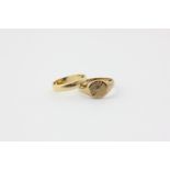 An 18ct wedding ring, 3g, and a 9ct gold signet ring, 3.7g
