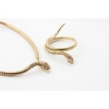 A 9ct yellow gold snake necklace with gem set eyes, and a matching bangle 54.2 g gross