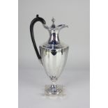 A George III silver ewer, maker Thomas Chawner, London, 1786, with engraved crest and floral