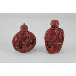 Two Chinese cinnabar lacquered snuff bottles, one carved with a landscape, the other with blossoming