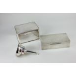 A George V silver rectangular cigarette box, with engine turned decoration, 18cm, London 1924, a