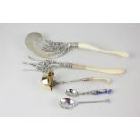 A pair of Sterling silver servers, fork and slice with cast scroll decoration, a matching sterling