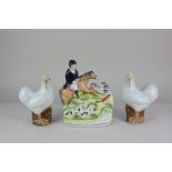 A Staffordshire pottery flatback figure of a huntsman on horse with hounds and a fox 20cm,