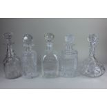 Five cut glass spirit decanters one by Webb Corbett