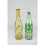 A white metal mounted Bohemian green flash cut glass decanter decorated with vine leaf design,